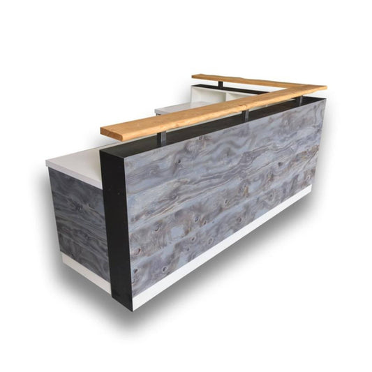 Transitional reception desk with distressed wood and live edge riser 